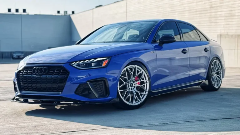 Blue Audi sedan with a gloss blue wrap