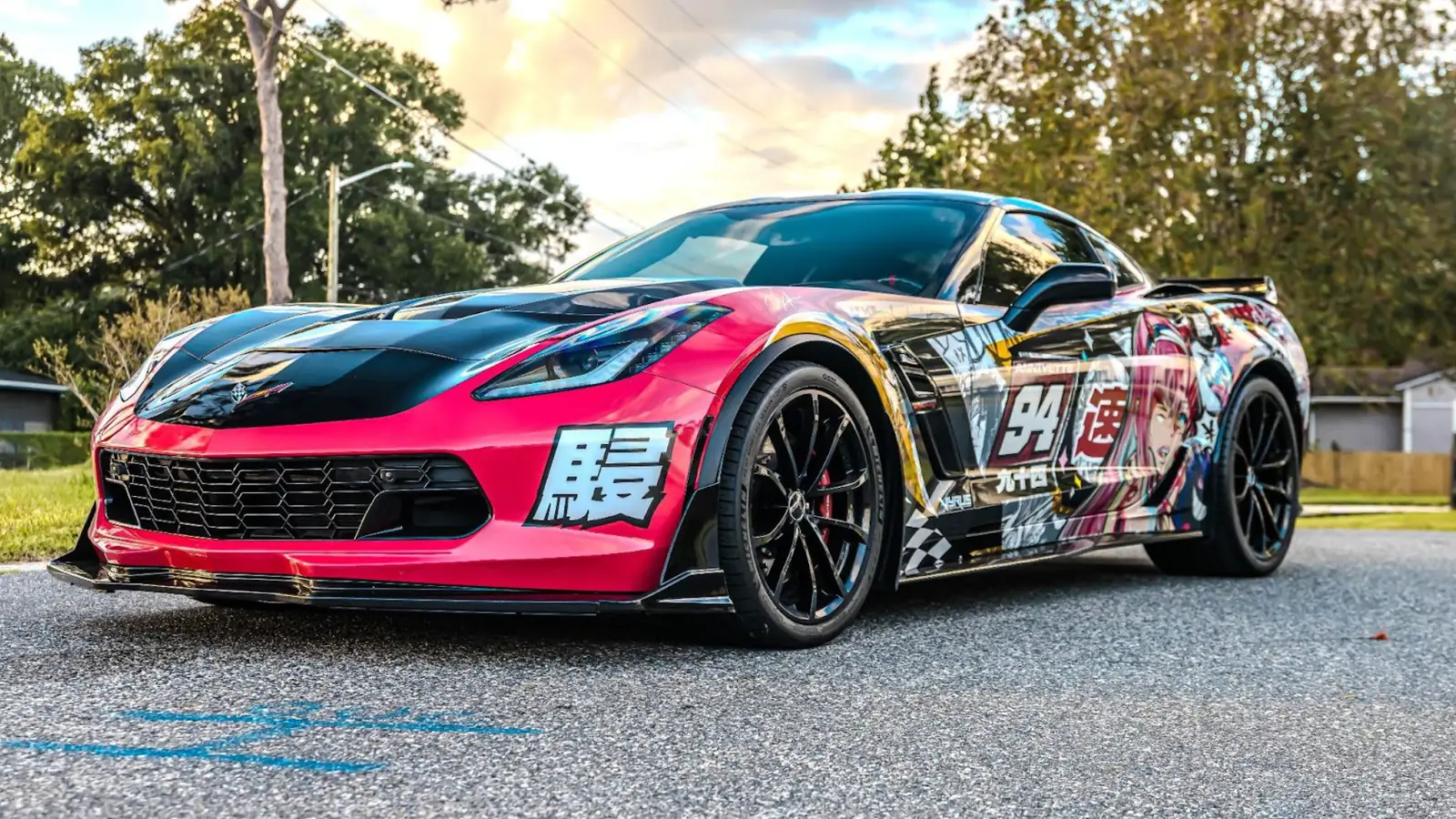 Corvette with an anime race livery wrap, front angle