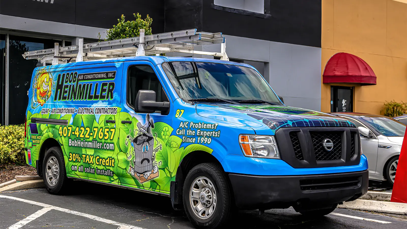 Nissan NV van with a full commercial wrap for an HVAC company