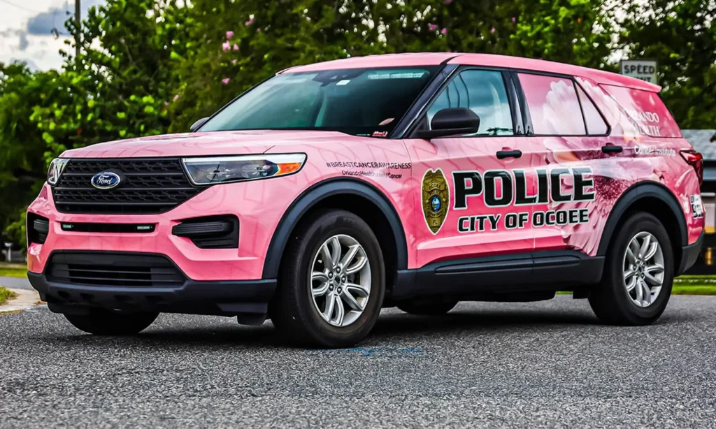 Pink Ford Explorer police vehicle wrap for the City of Ocoee