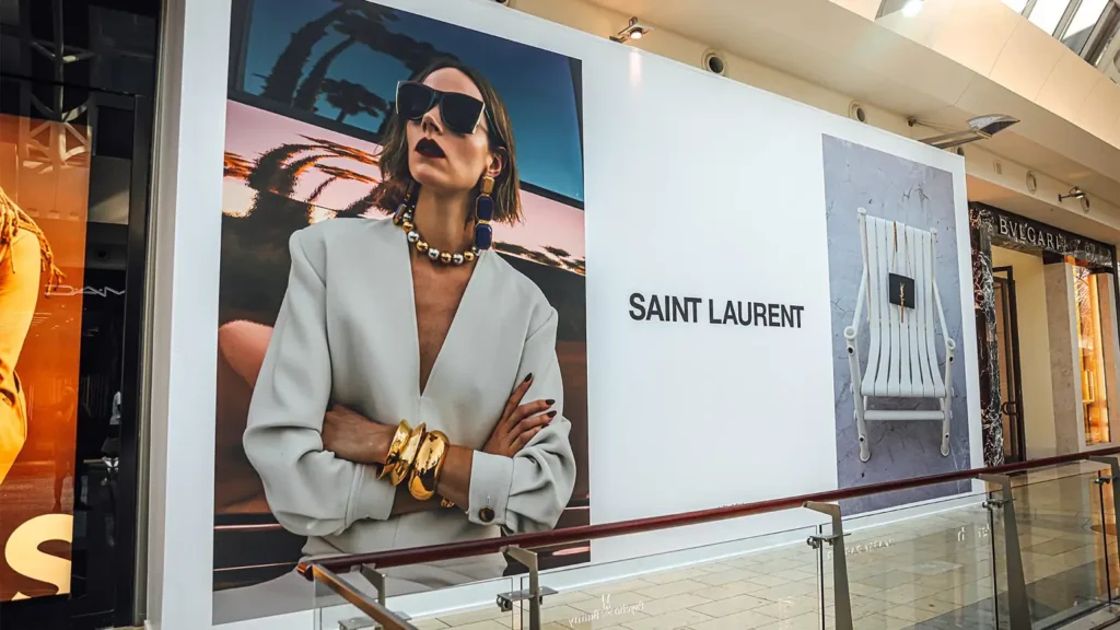 Large wall graphic installed for Saint Laurent inside a mall