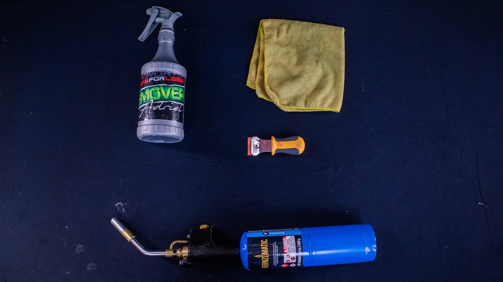 Wrap removal tools: adhesive remover, microfiber towel, scraper and heat torch